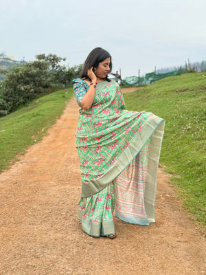 Effortless Elegance: The Timeless Appeal of a Green Saree