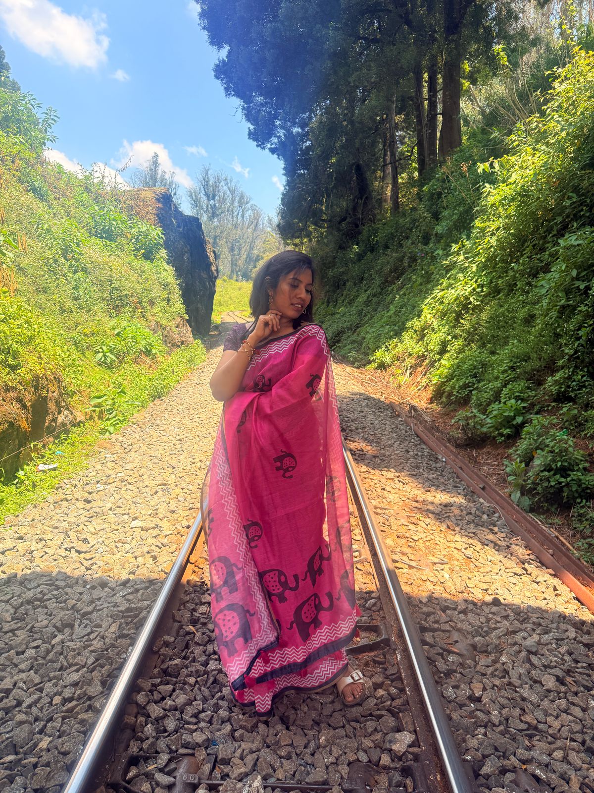 Pink Saree with Black and Red Accents