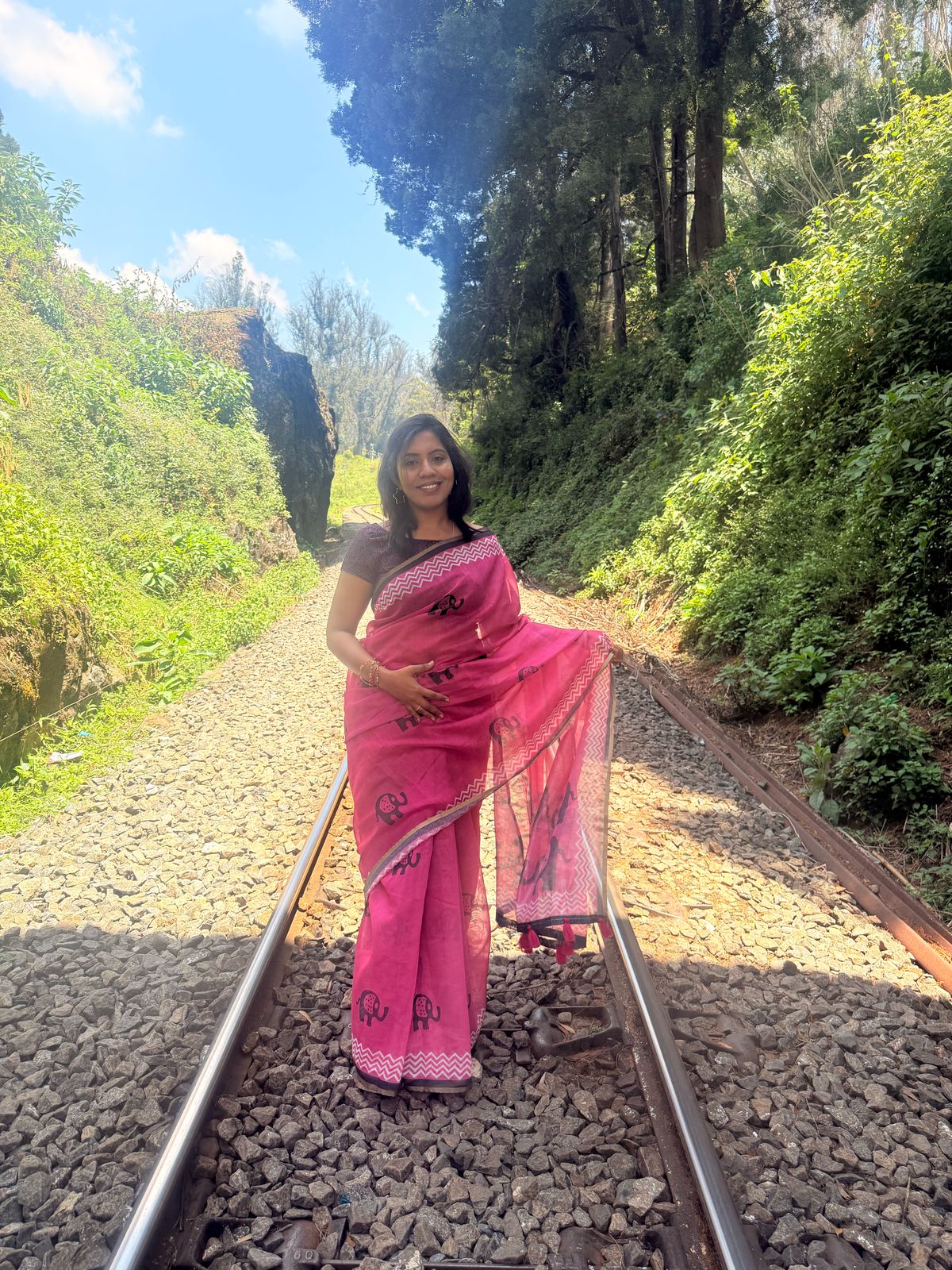 Pink Saree with Black and Red Accents