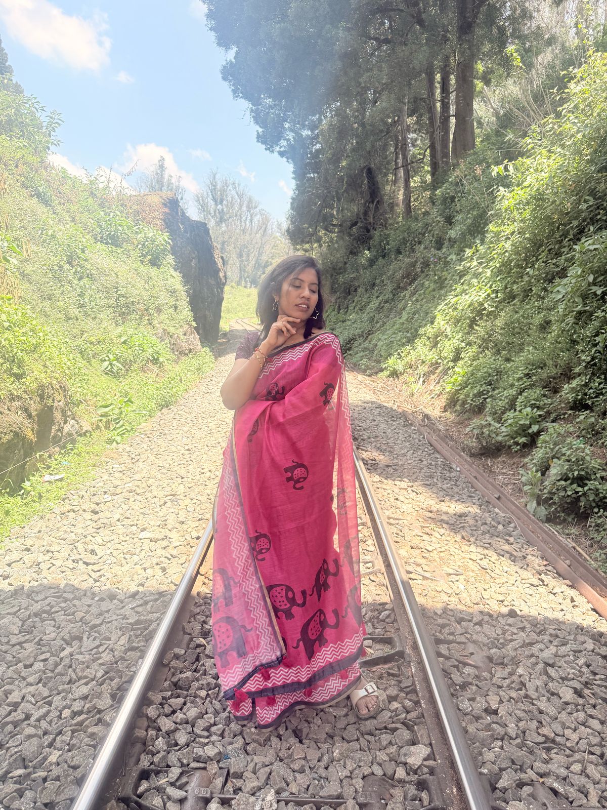 Pink Saree with Black and Red Accents